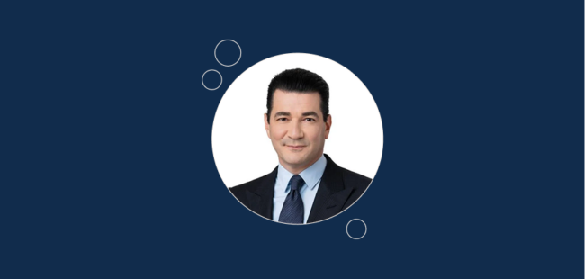 scott gottlieb, former fda commissioner, smiles in a suit.